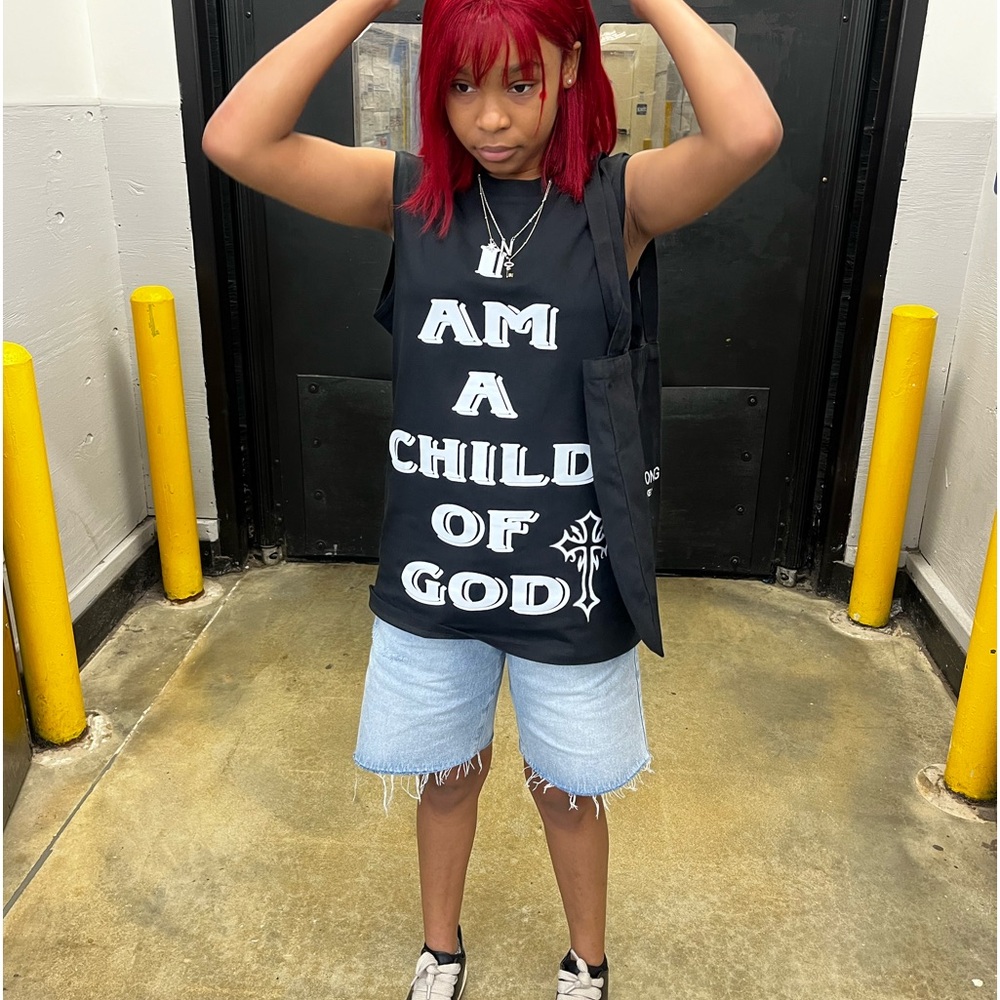 I’m selling Defintion Of Apparel sleeveless shirt. “I AM A CHILD OF GOD”